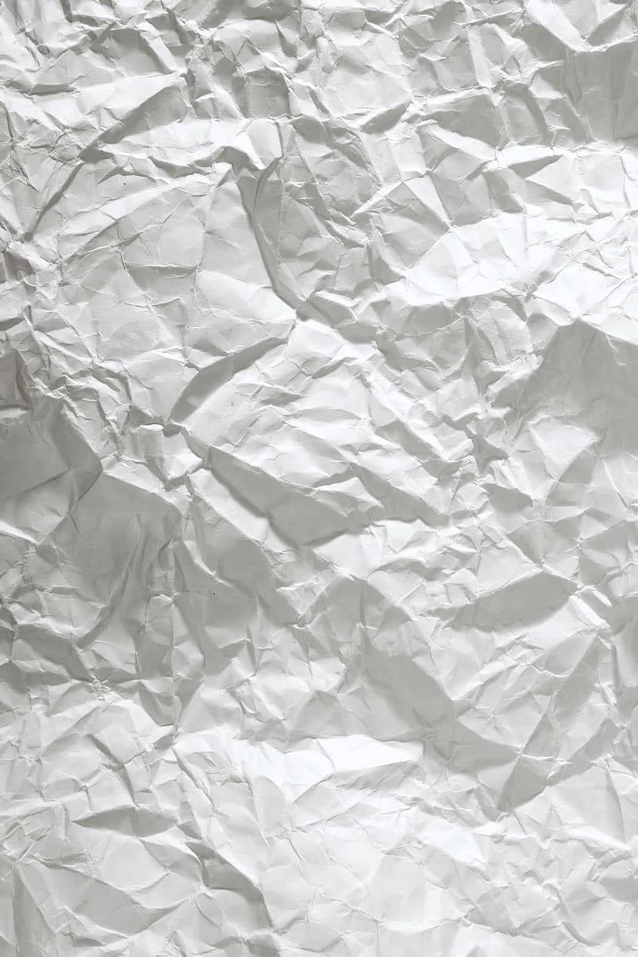 Weißeszerknittertes Papiermuster Wallpaper