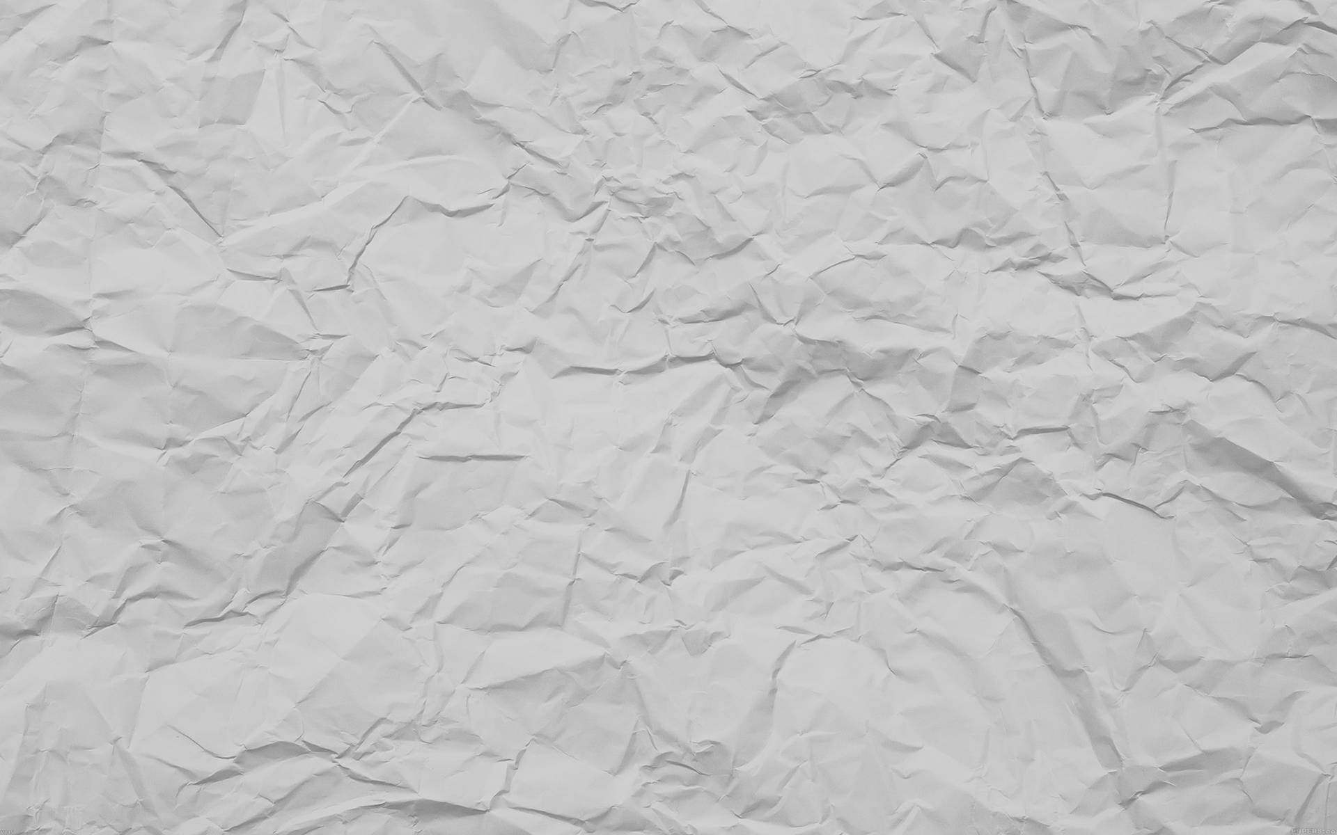 A Detailed Close-up of White Crumpled Paper Texture Wallpaper