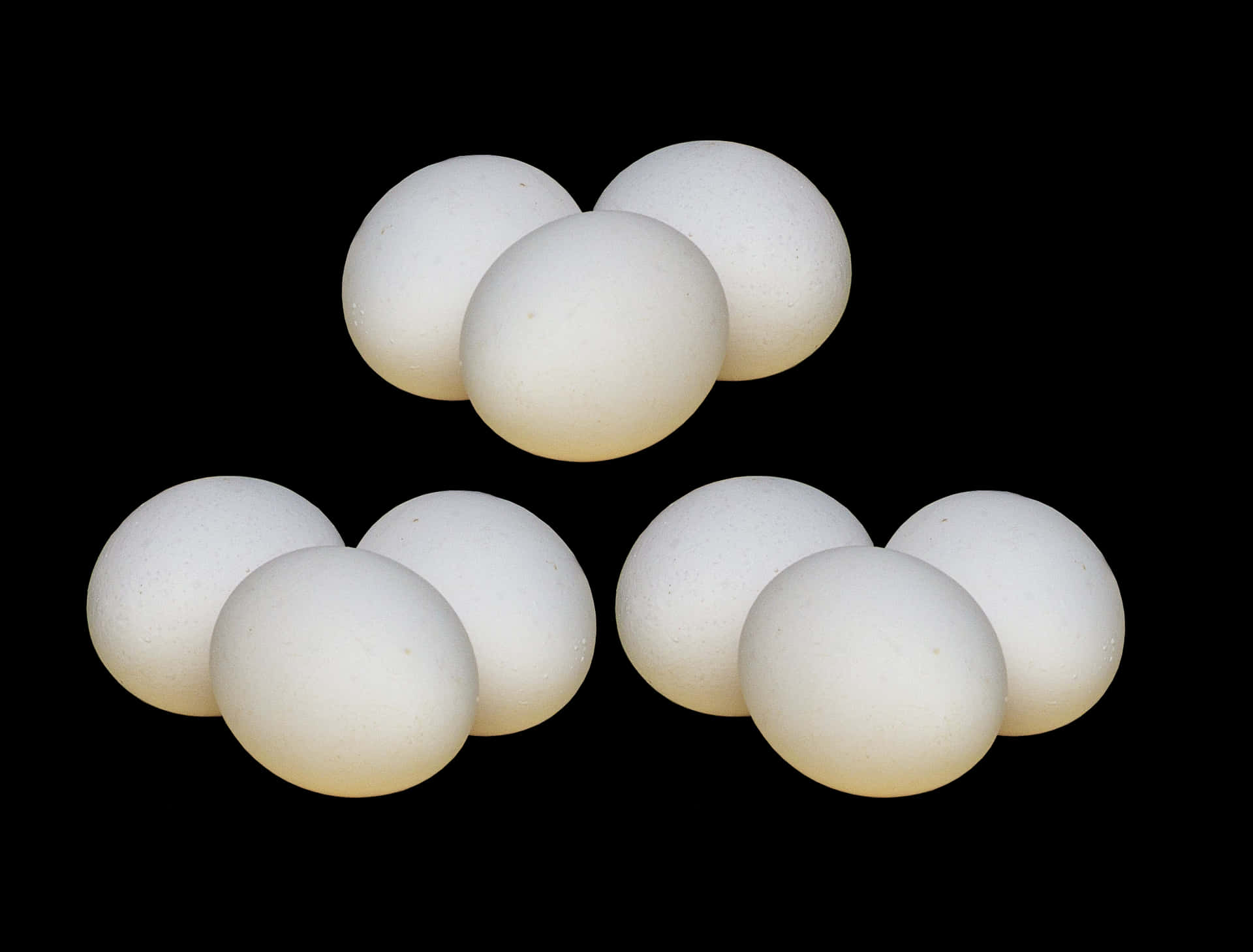 White Eggs Against Black Background PNG