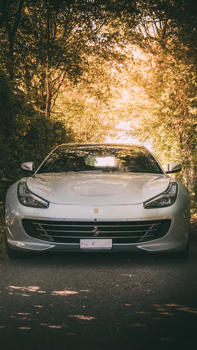 Cruise around in class with this all-white Ferrari iPhone Wallpaper