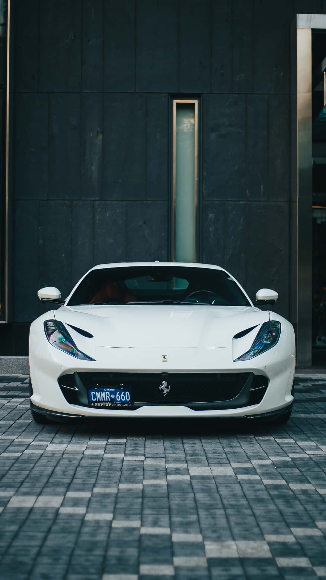 Driving luxury in style with a white Ferrari iPhone. Wallpaper