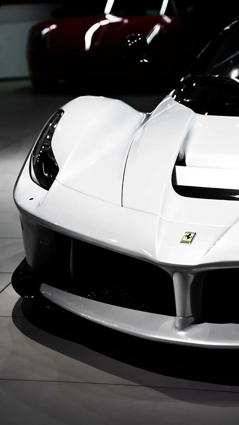 Feel the power of the streets with this White Ferrari Iphone Wallpaper