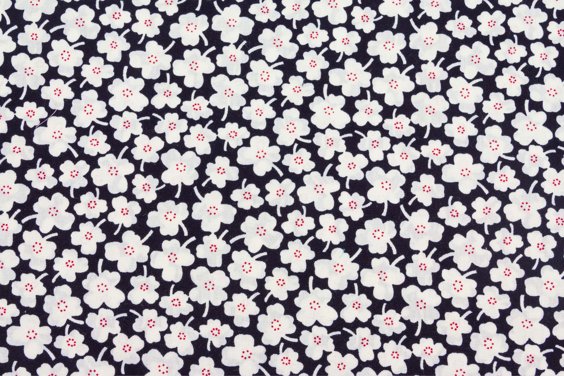 White Floral Patternon Black Fabric Wallpaper