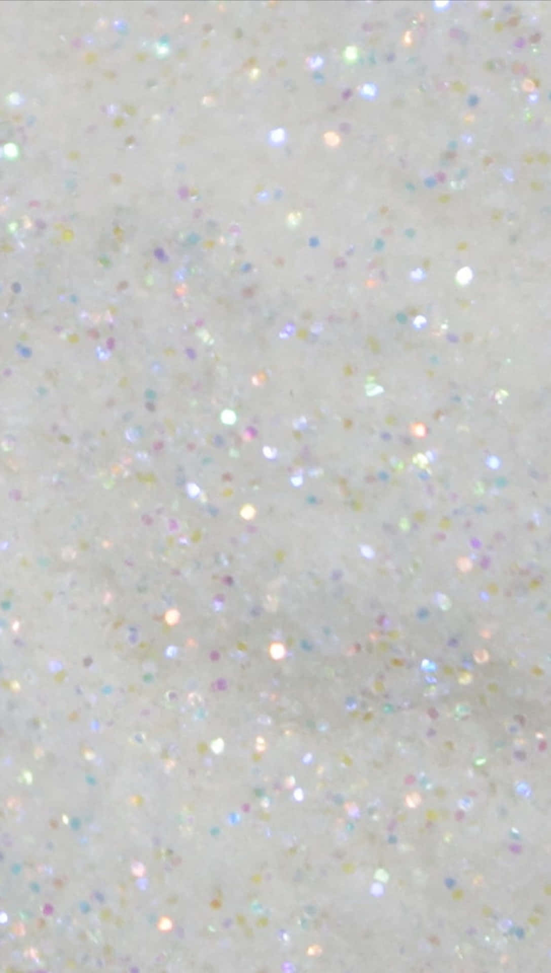 En hvid overflade med masser af glimtende stjerner Wallpaper