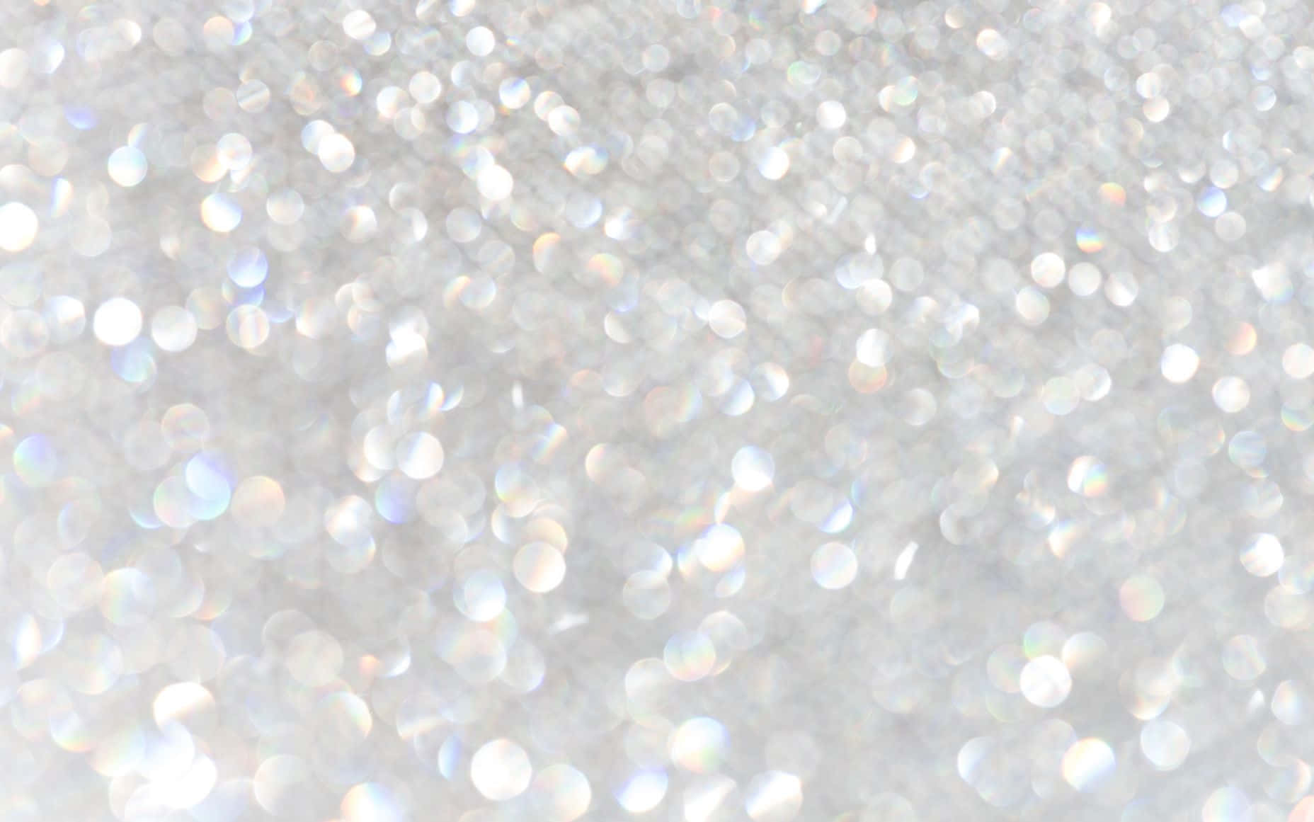 Download Gold and Silver Glitter Against a White Background Wallpaper |  