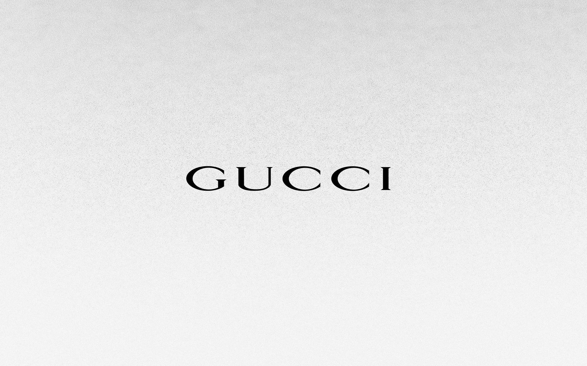 Luxury Defined - Exquisite Gucci Emblem in 4K resolution Wallpaper
