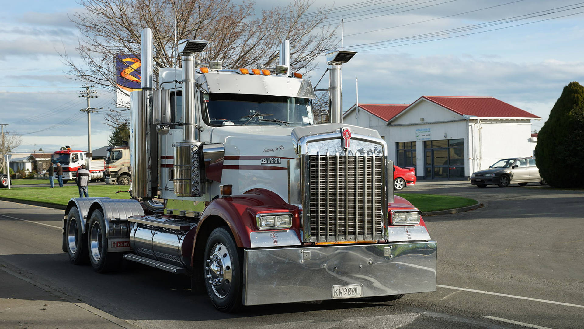 Stunning White Kenworth W900 on the Open Road Wallpaper