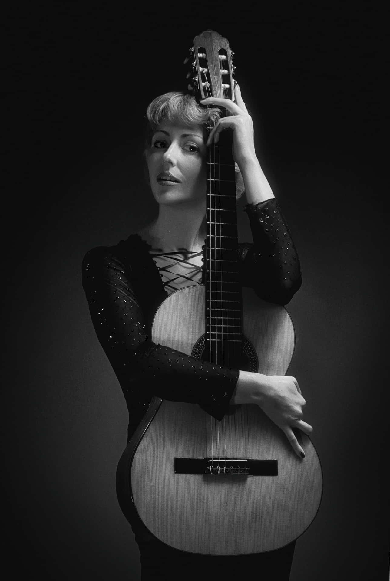 White Lady Modeling Guitar Wallpaper