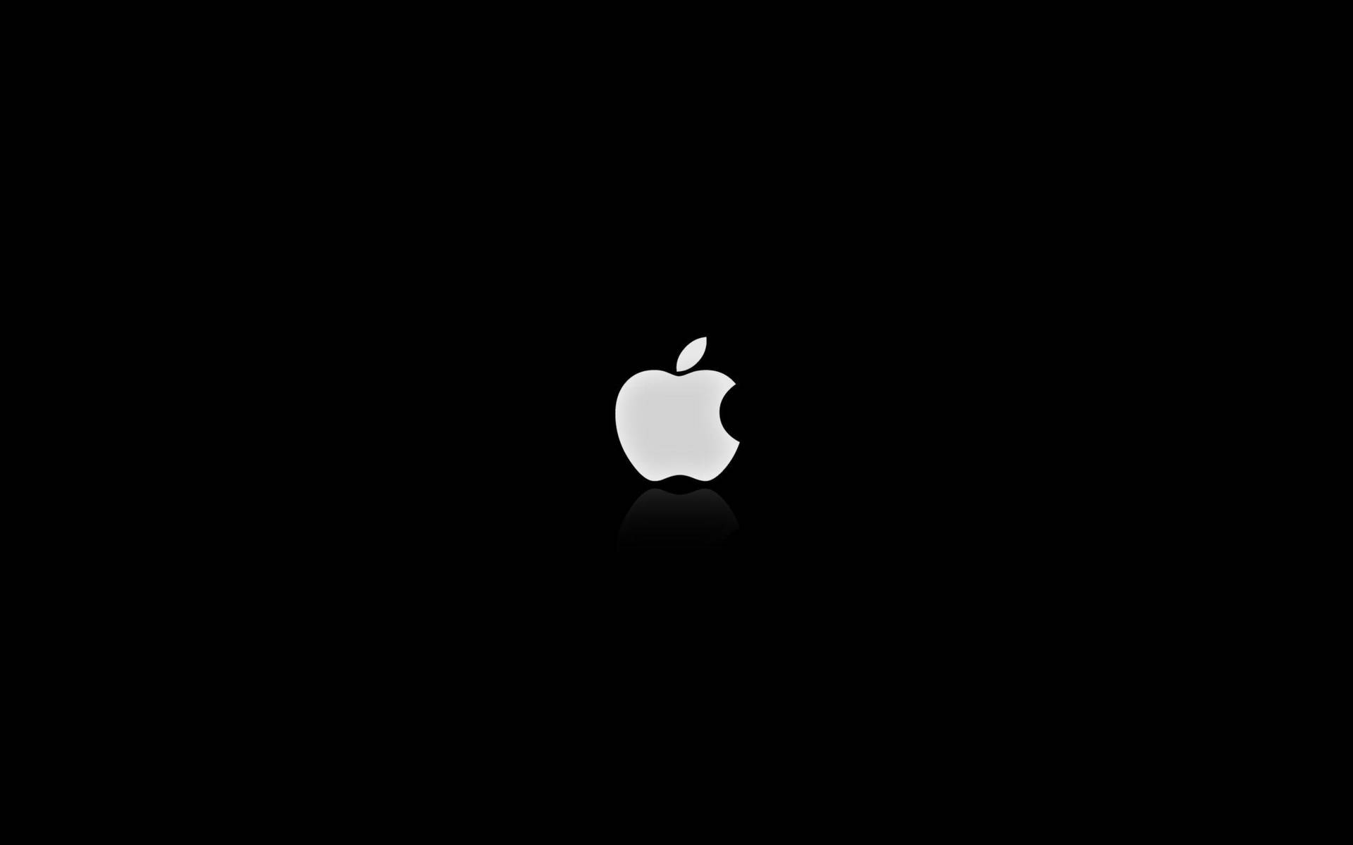 White Lit Apple Logo Dark Screen Wallpaper