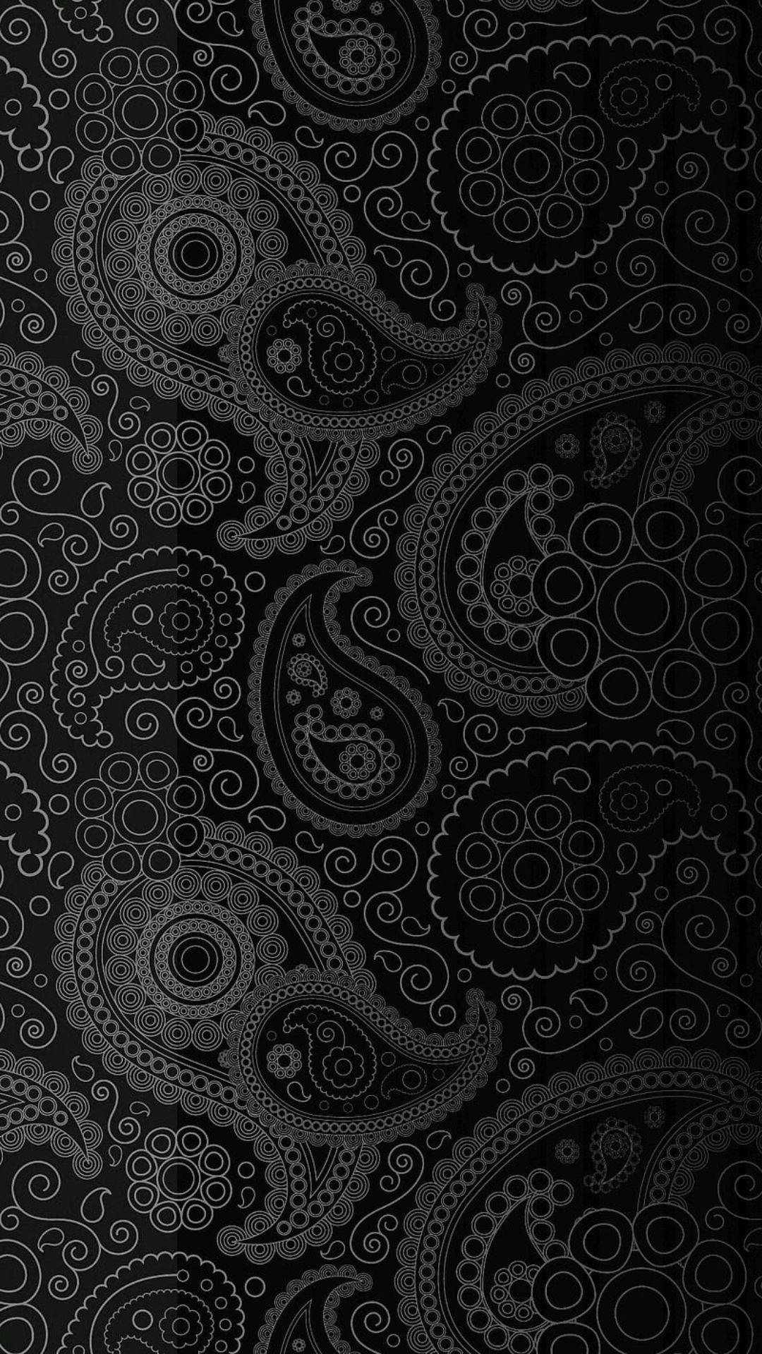 Artistic White Mandala Doodle on a Black Background Wallpaper