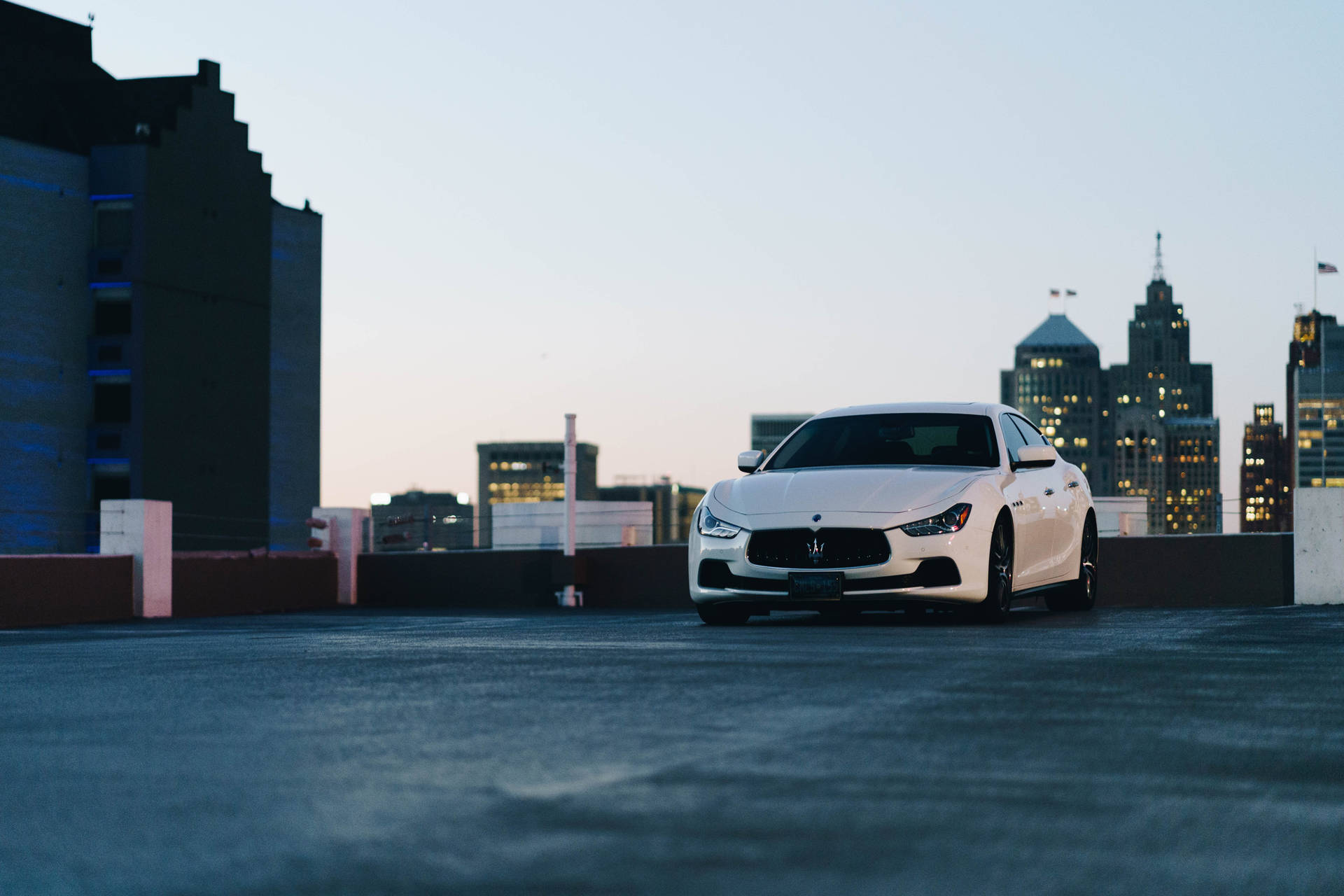 White Maserati And Cityscape