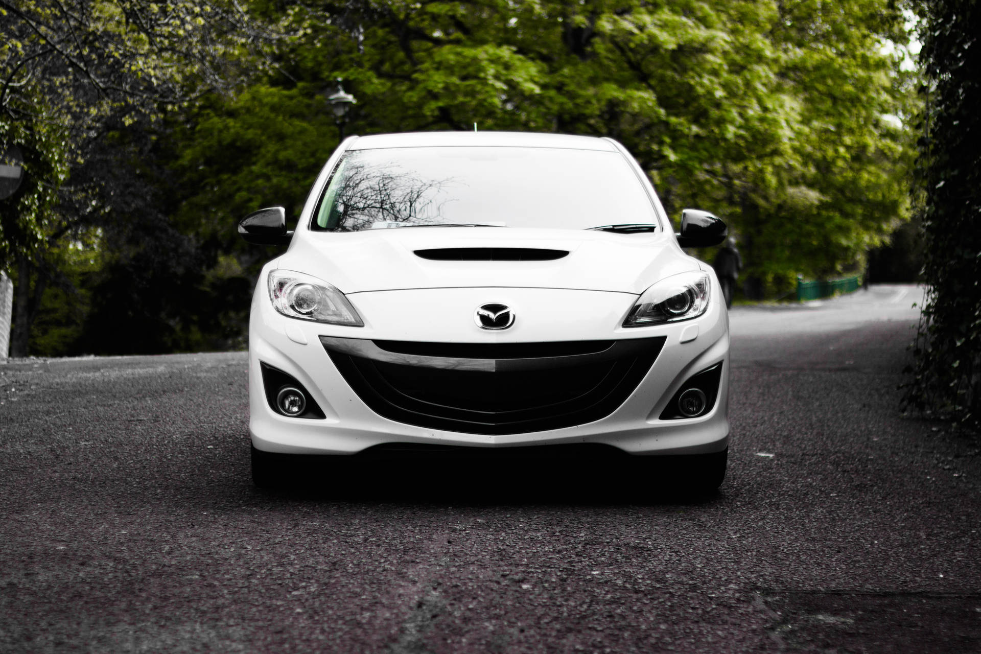 Caption: Sleek White Mazda 3 Hatchback Wallpaper