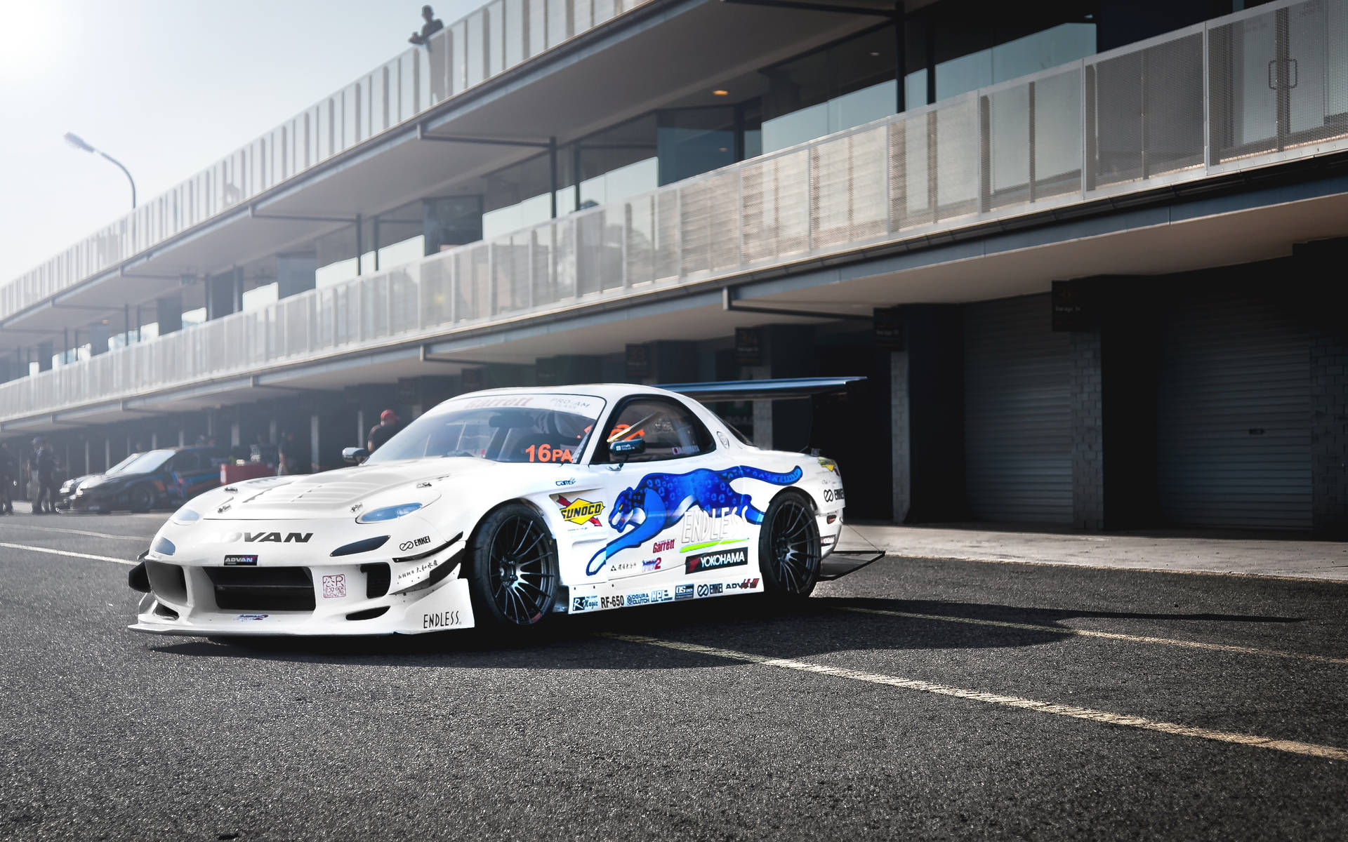 White Mazda Rx7 With Decals Wallpaper