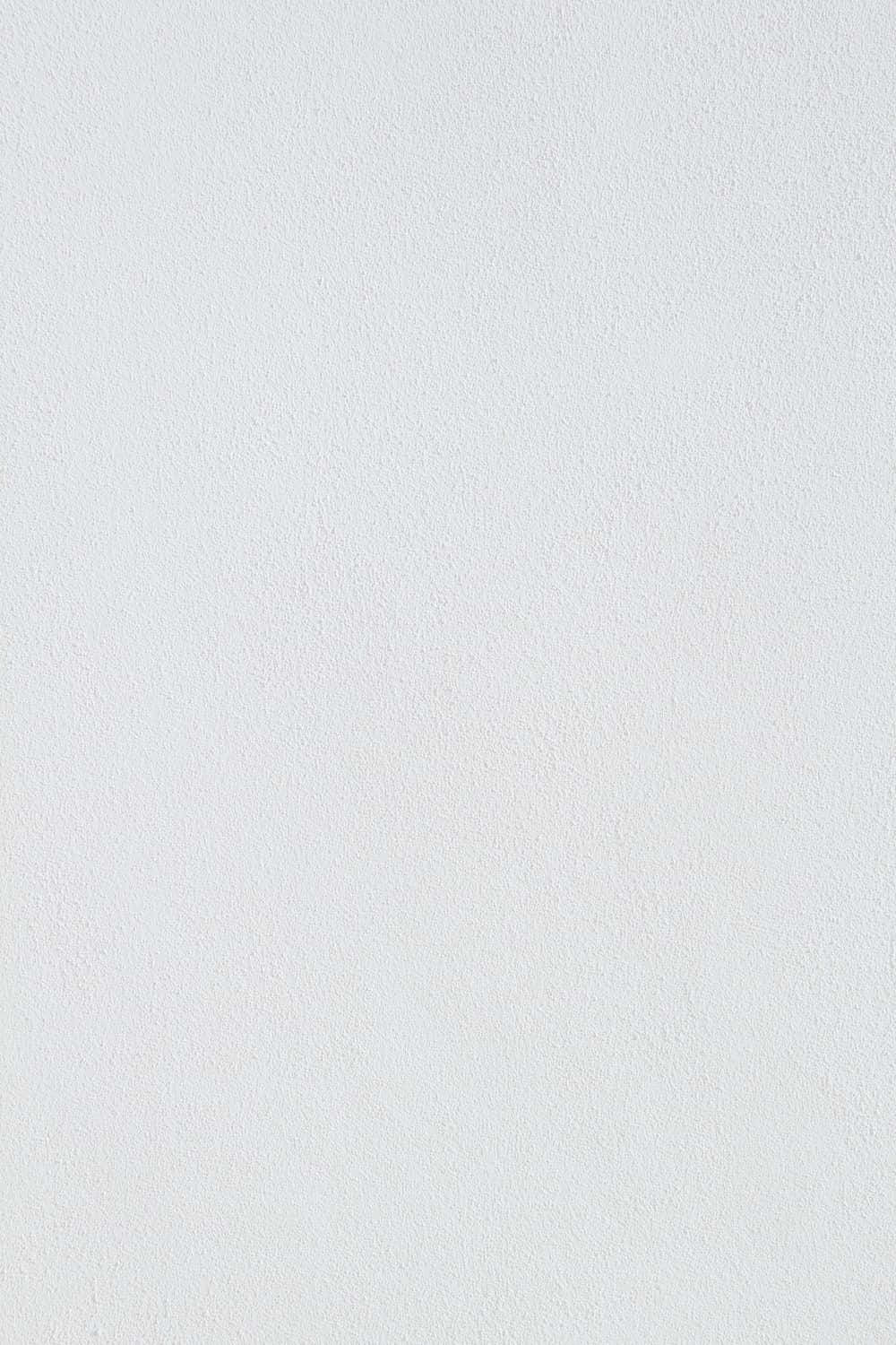 A White Wall With A White Tv Screen