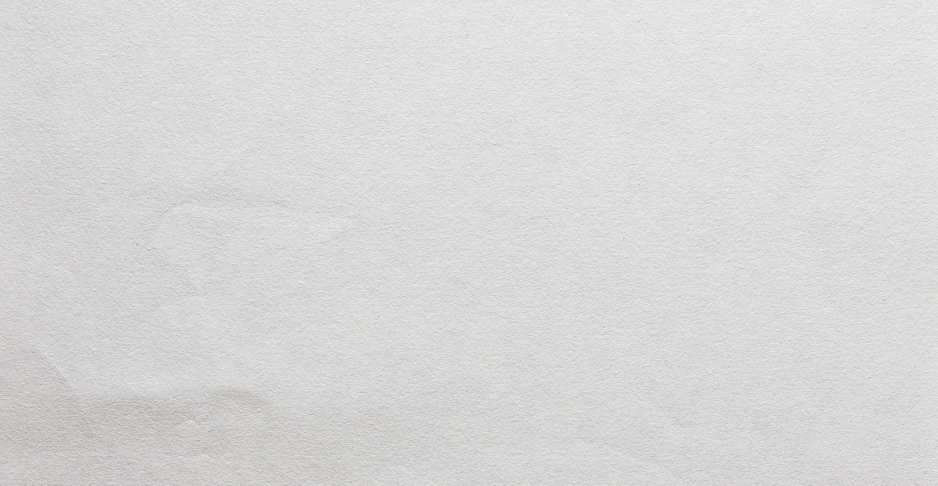 A blank white paper background perfect for taking notes and writing down ideas