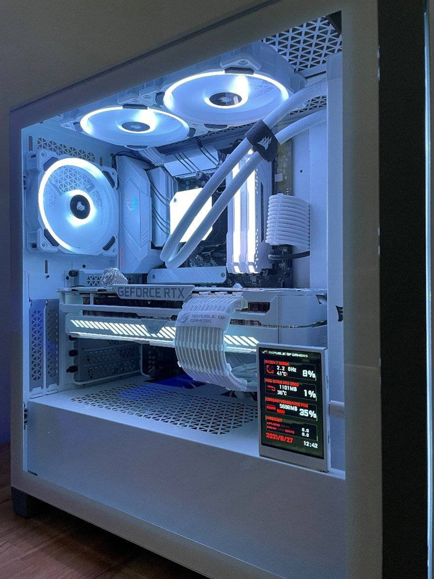 A Computer Case With A Fan And Lights Inside Wallpaper