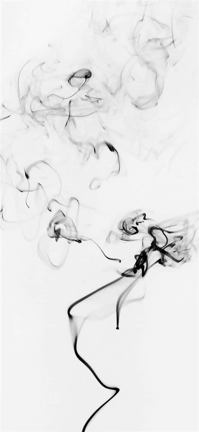 A Black And White Photo Of Smoke