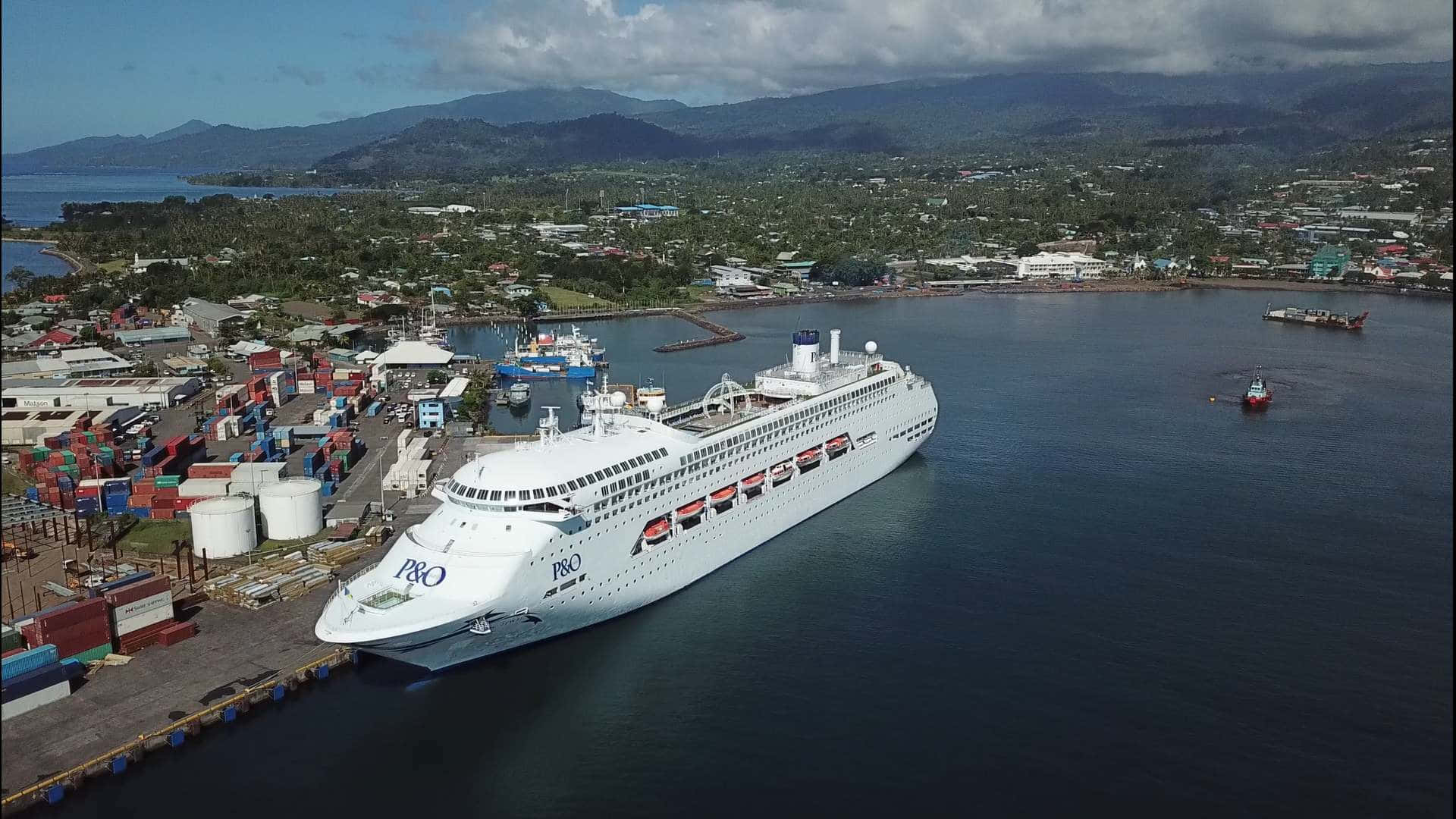 Captivating Apia: Majestic White Ship at Sundown Wallpaper