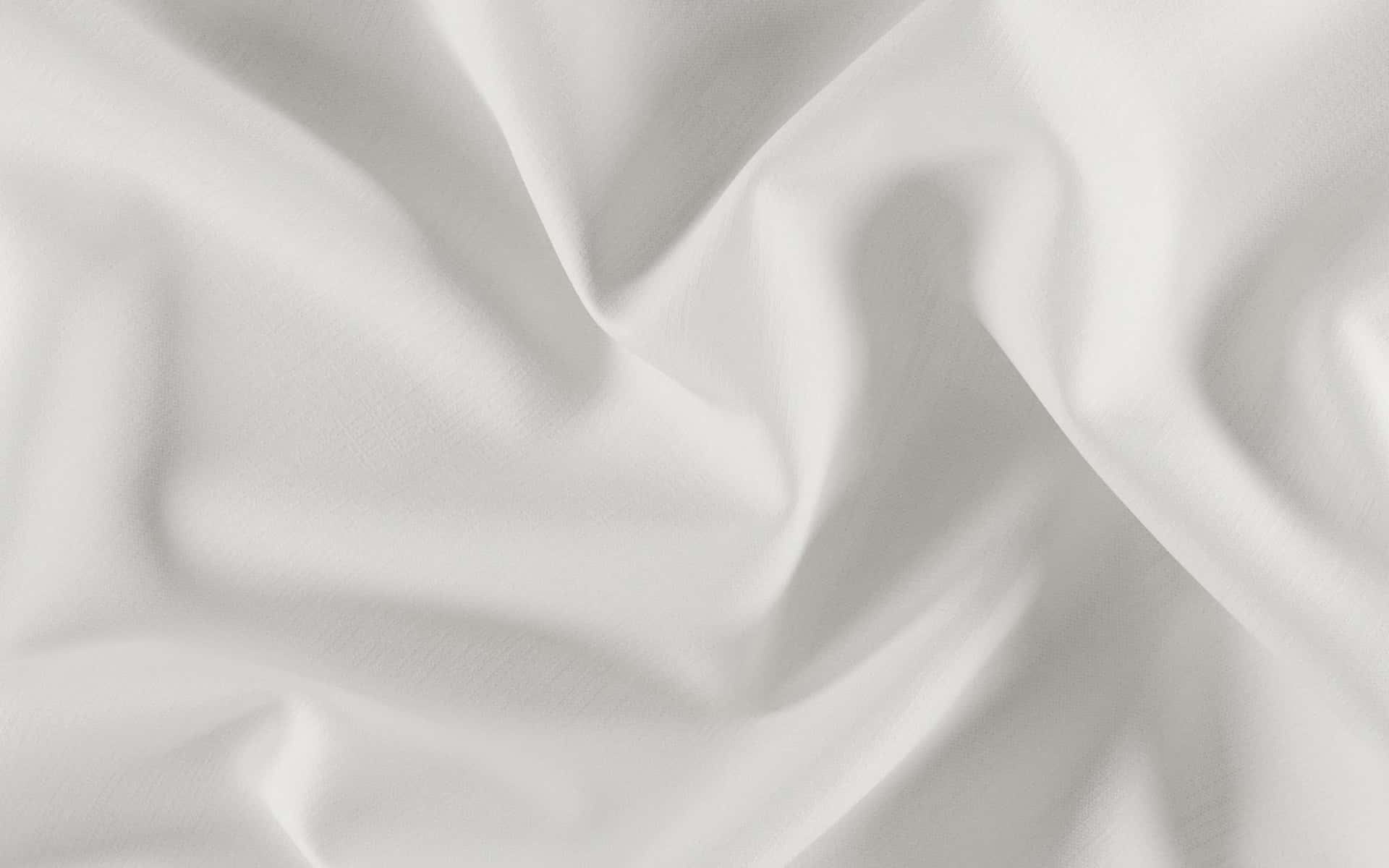 A Crumpled White Silk Background