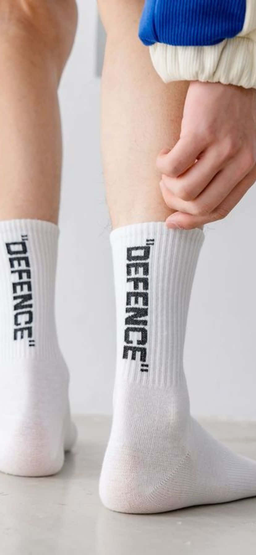 White Sports Sockswith Text Wallpaper