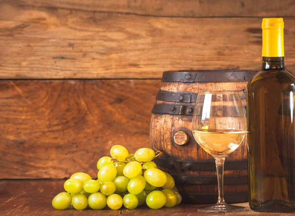 A glass of refreshing white wine Wallpaper