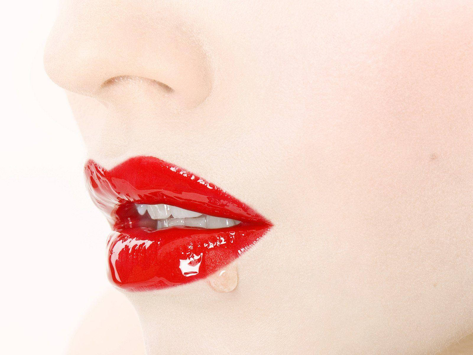 Download White Woman's Face With Red Watery Lips Wallpaper | Wallpapers.com