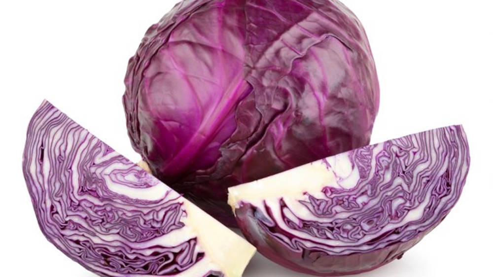 Fresh Whole and Sliced Red Cabbage Wallpaper