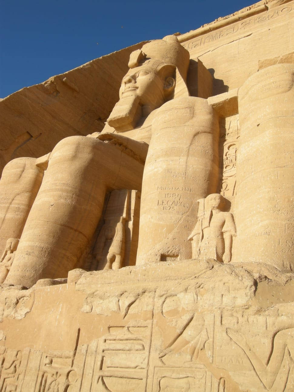 Whole-body Picture Of Ramses Ii The Great At Abu Simbel's Temple Wallpaper