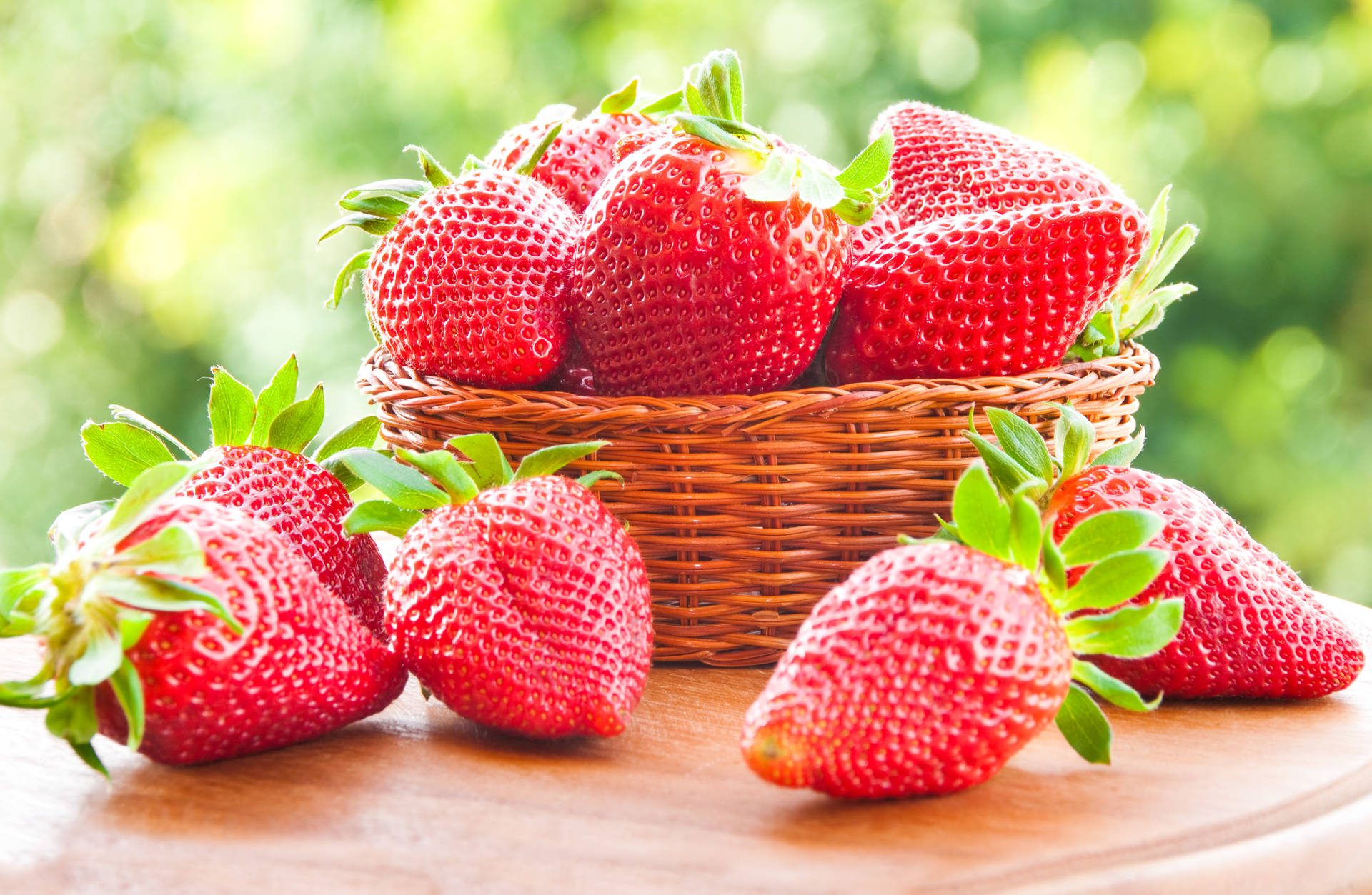 Wholesome Basket Of Strawberries Wallpaper