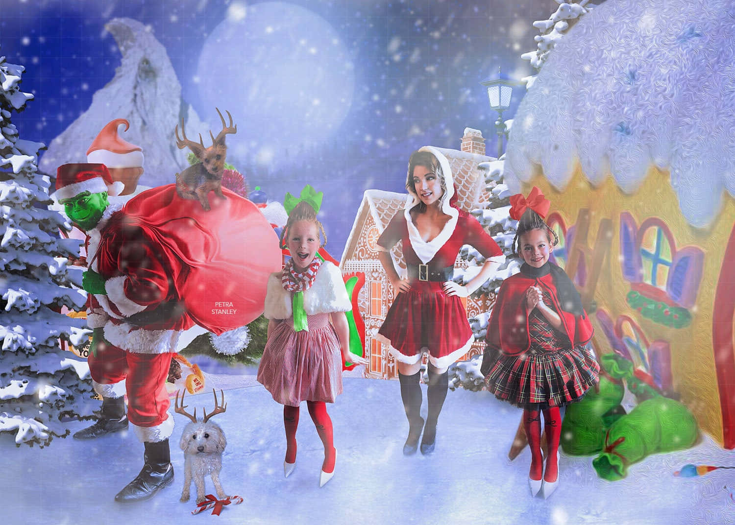 A Group Of Children And Santa Claus In A Snowy Scene Wallpaper