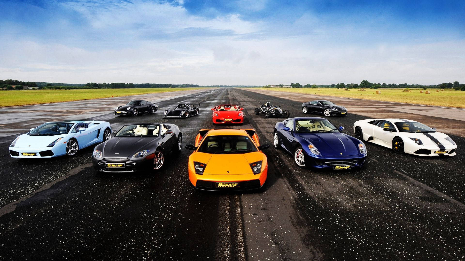 Widescreen super cars in rows wallpaper.