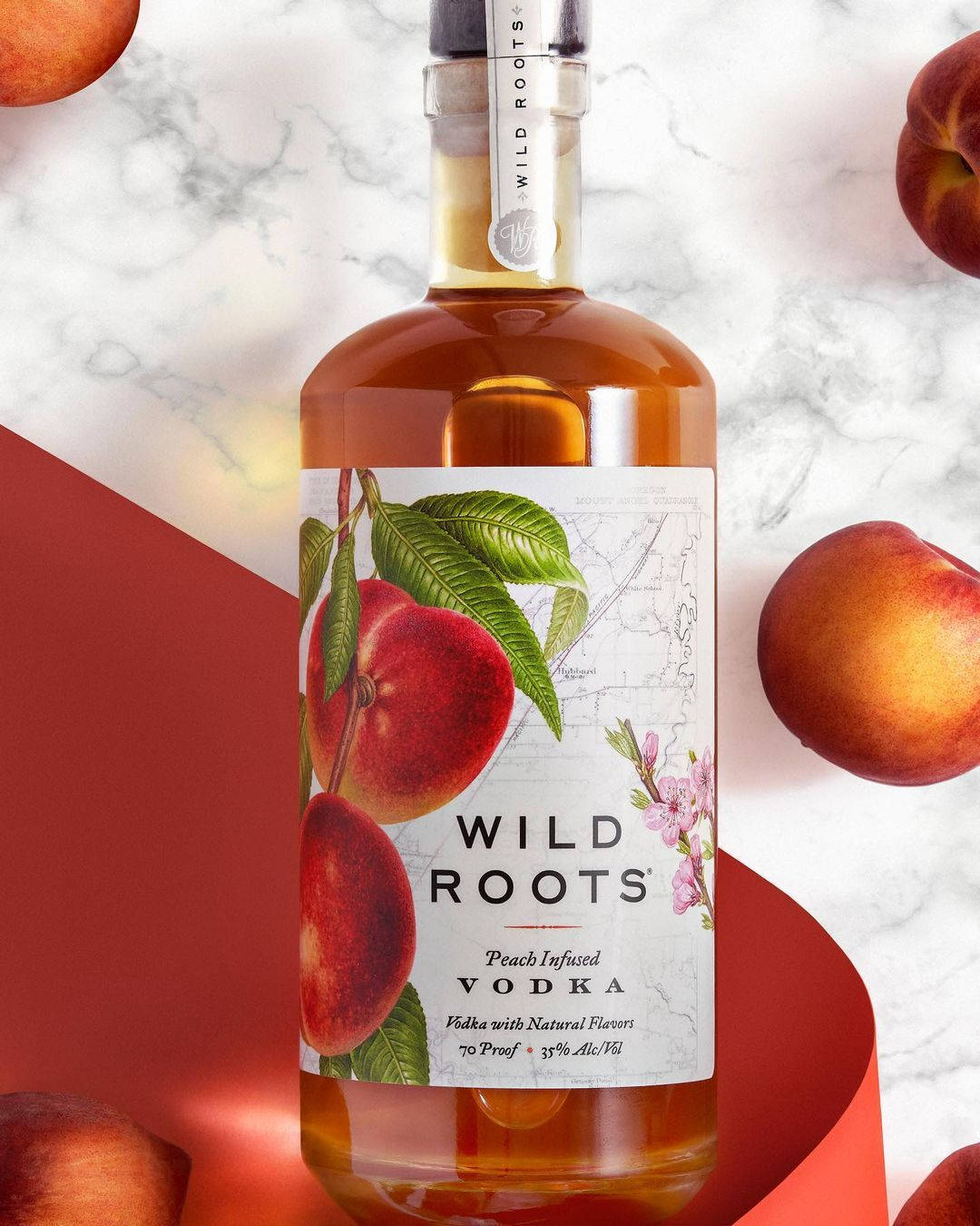 Wild Roots Huckleberry Vodka Bottle Wallpaper