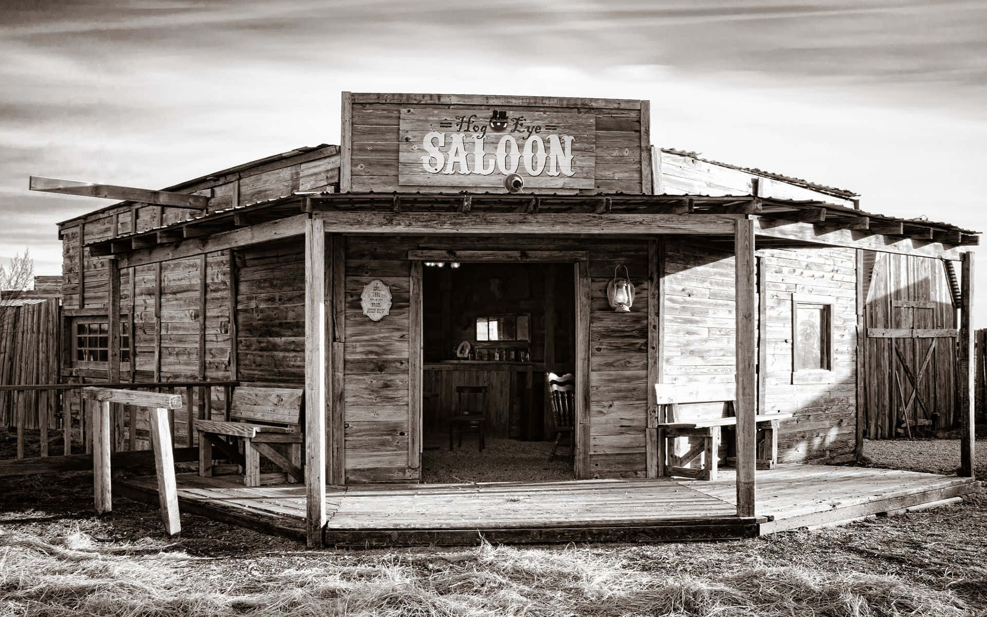 Wild West Saloon scenen skaber et væld af vilde natte skygger Wallpaper