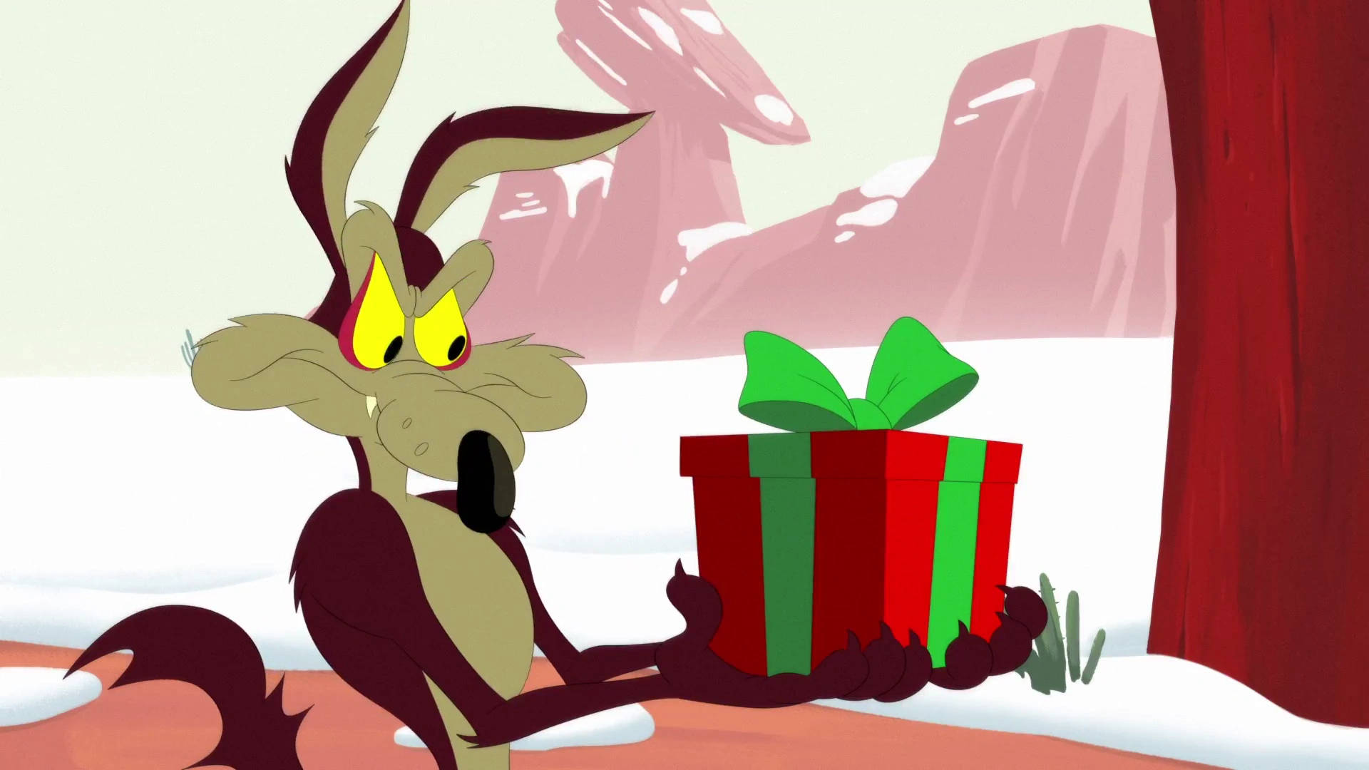 Wile E Coyote With Christmas Gift Wallpaper