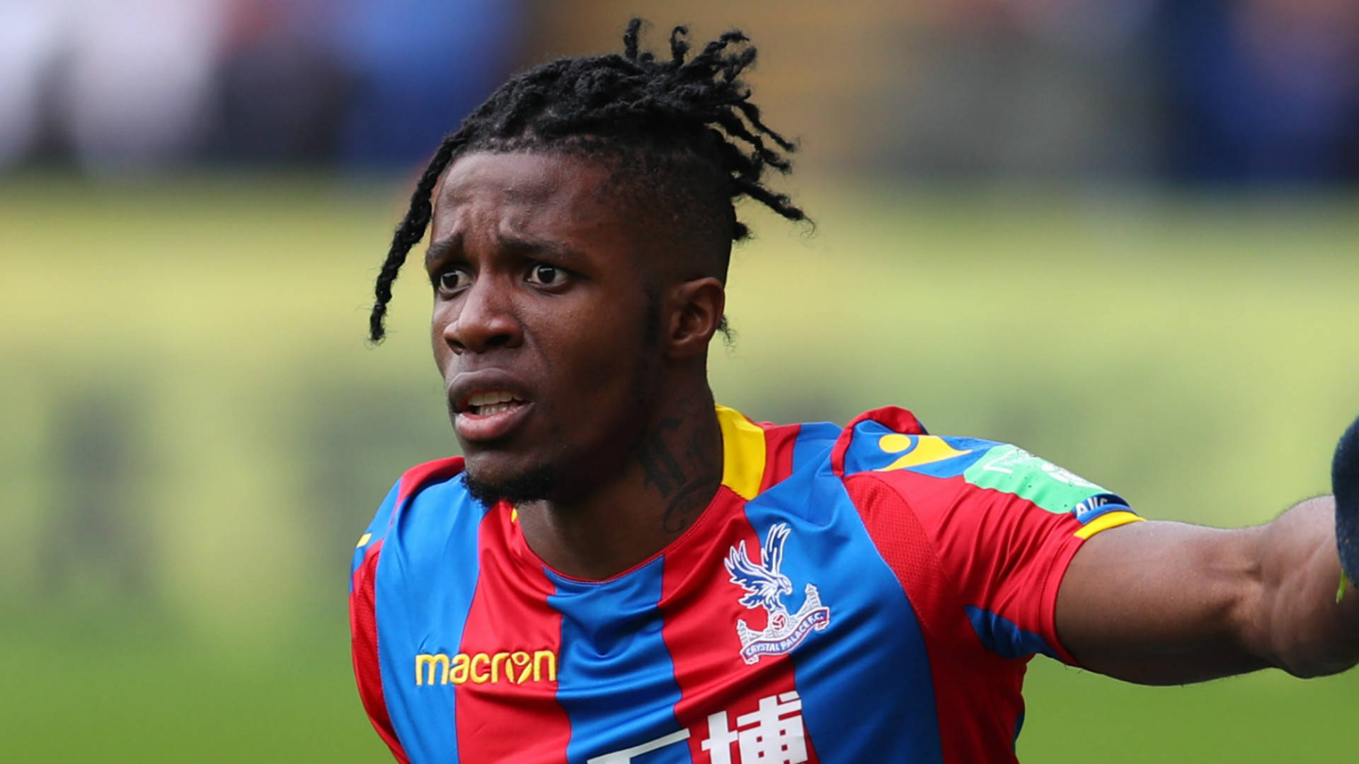 Wilfried Zaha With Hair Tied Up Wallpaper