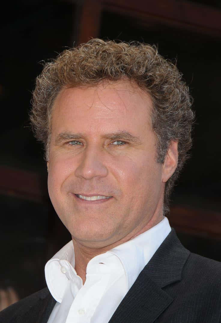 Caption: Will Ferrell Smiling in a Stylish Suit Wallpaper