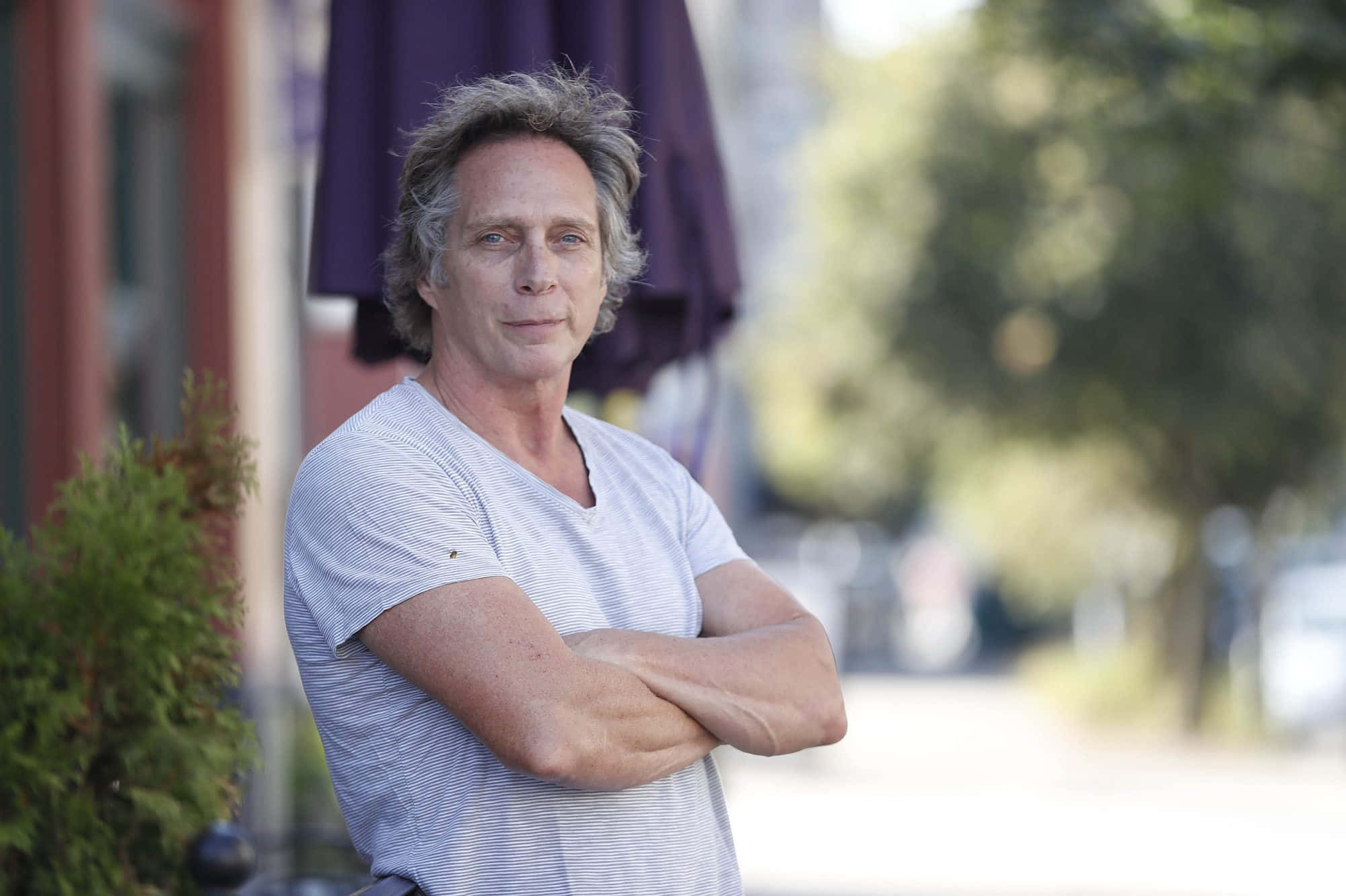 William Fichtner confidently posing for a portrait Wallpaper