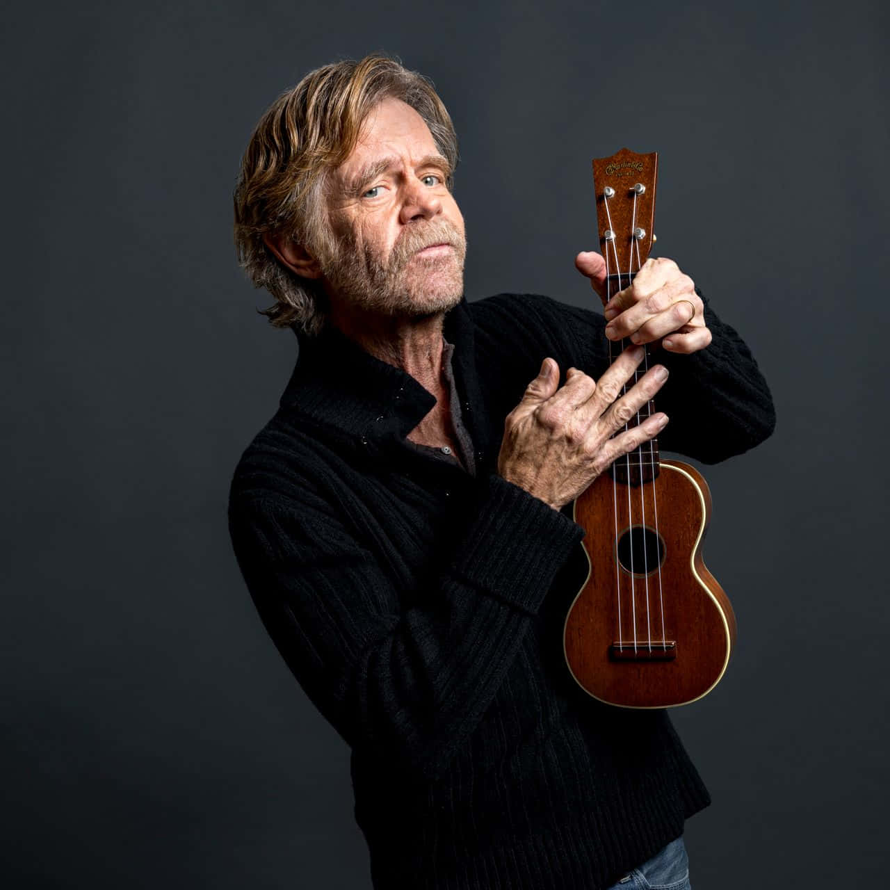 William H. Macy Smiling at a Hollywood Event Wallpaper