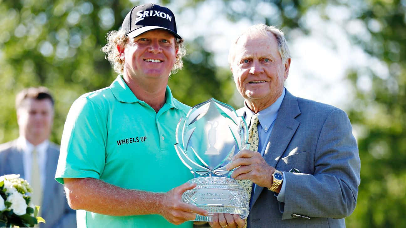 William Mcgirt With A Trophy Wallpaper