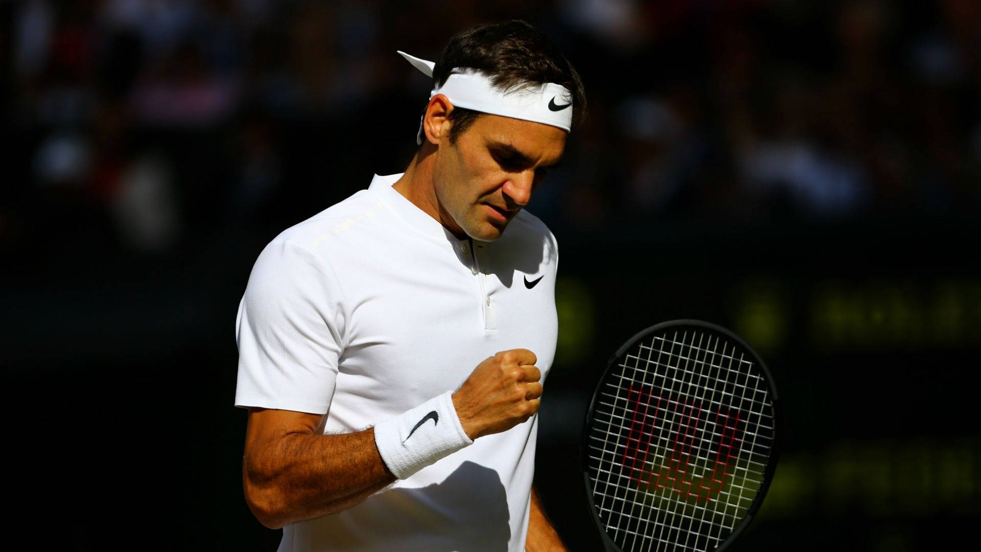 Wimbledonmästareroger Federer Candid. Wallpaper