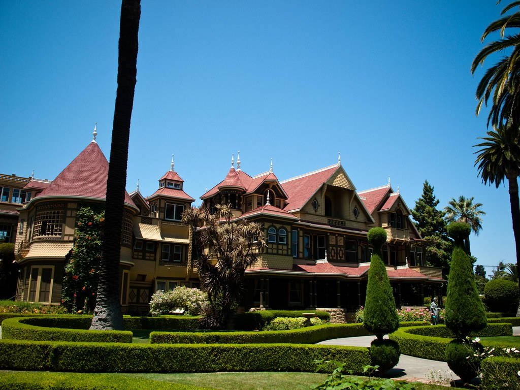 Winchester Mystery House With Topiaries Background