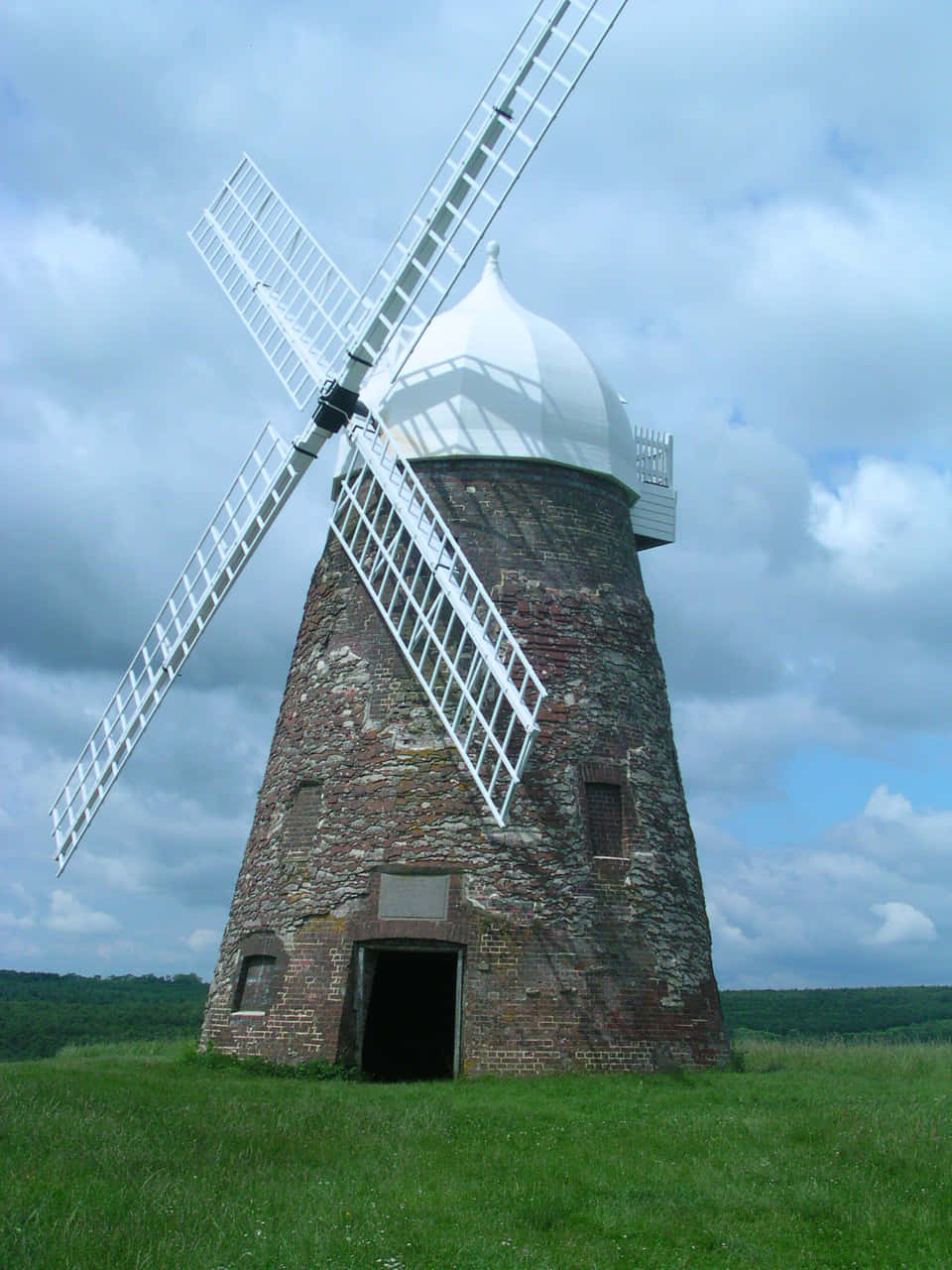 Majestic Windmill under Serene Sky
