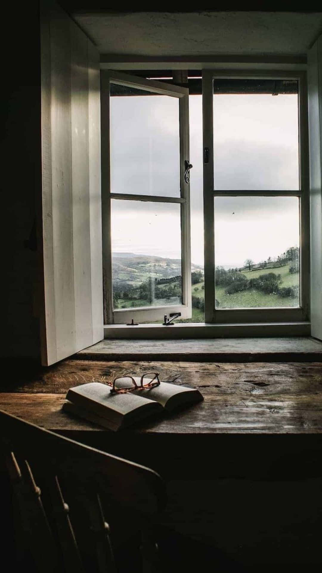 View of a window facing a beautiful landscape.