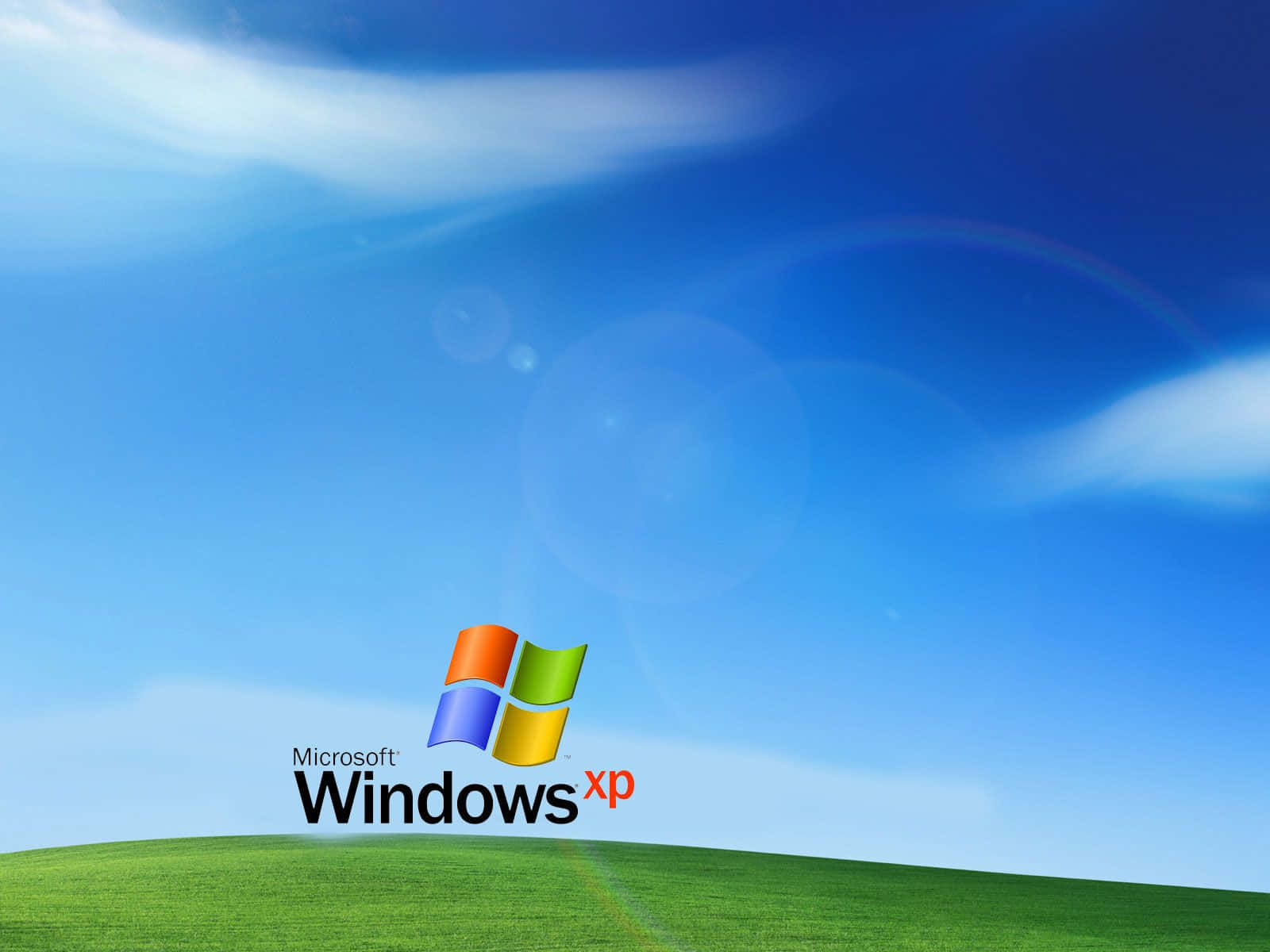 "The familiar blue background of Windows XP"