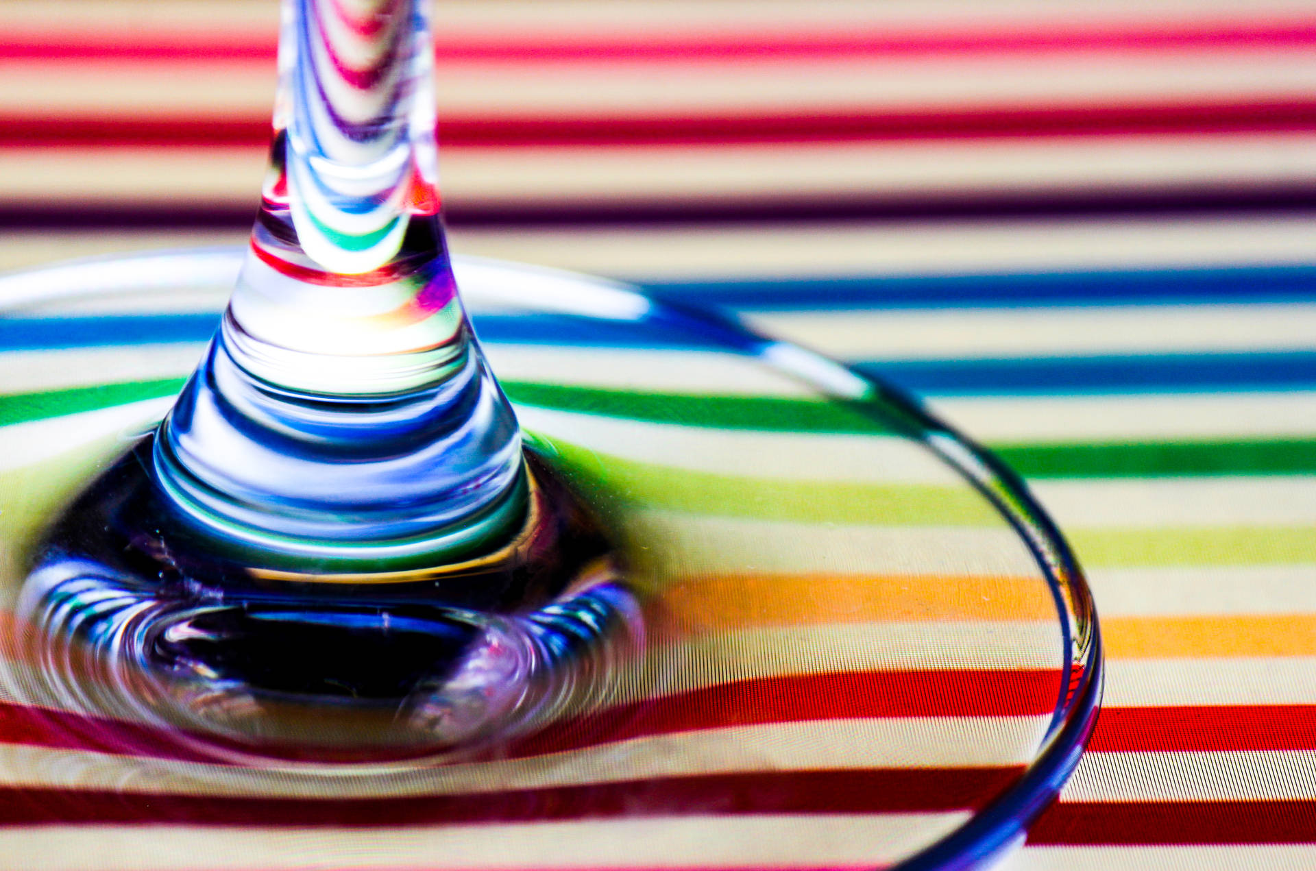 Wine Glass On Rainbow Stripes Surface Wallpaper