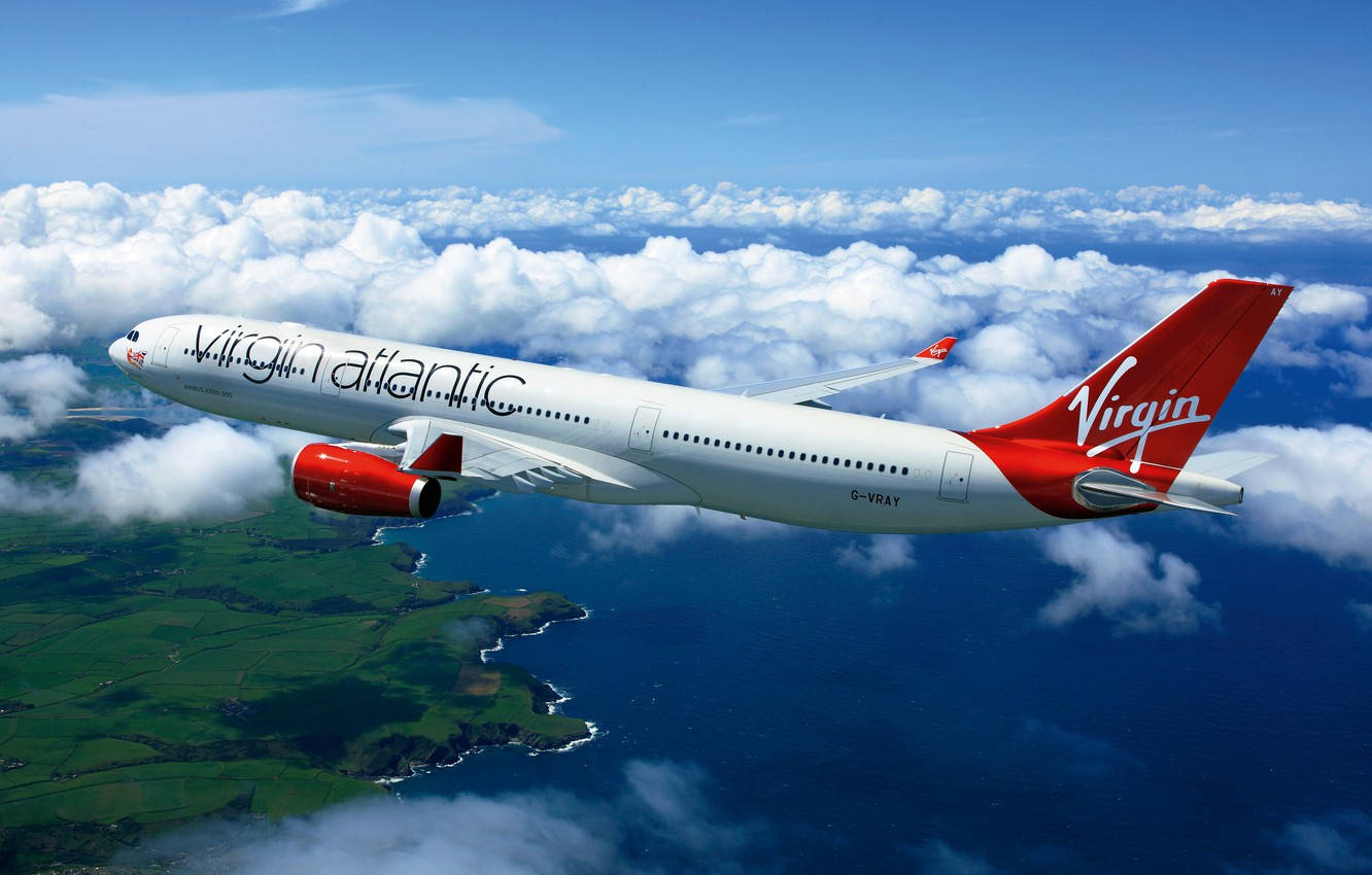Vingerne en Virgin Atlantic fly gennem farvande himmel Wallpaper