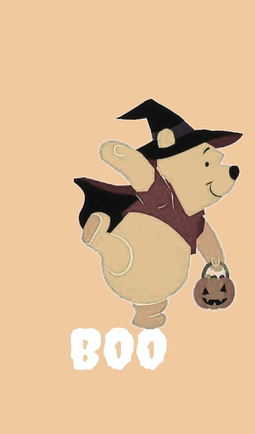 Winnie The Pooh Aesthetic With A Halloween Costume Wallpaper