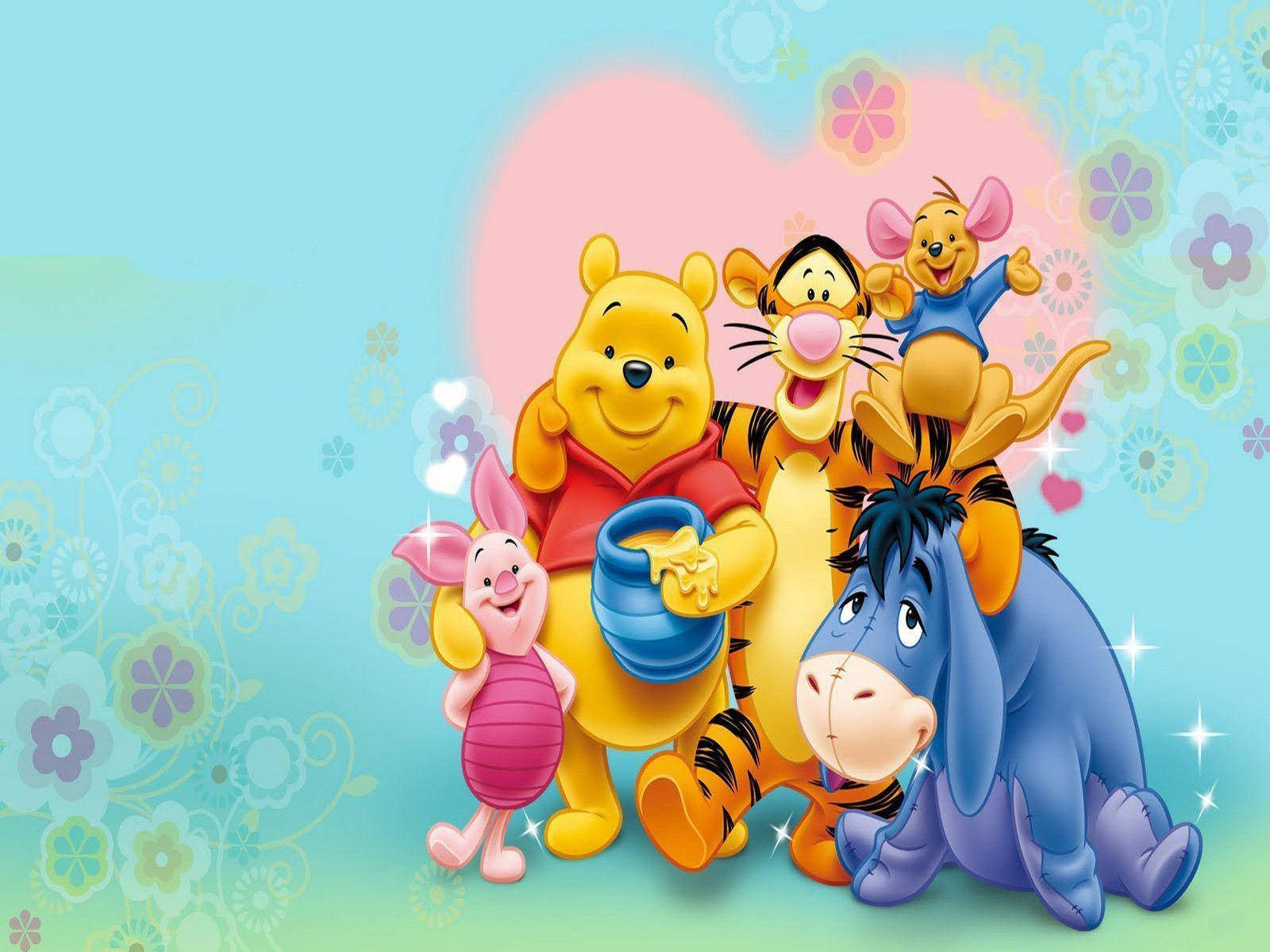 Winnie The Pooh and friends share a heartwarming moment. Wallpaper