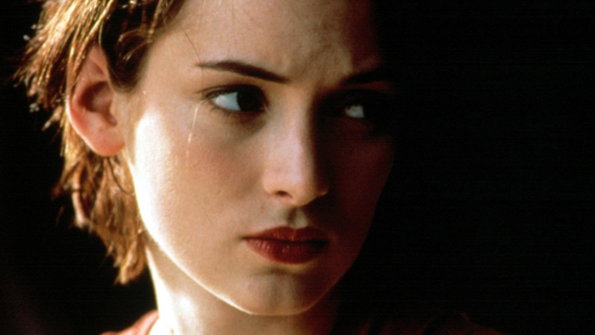 Winona Ryder In The Shadows Wallpaper