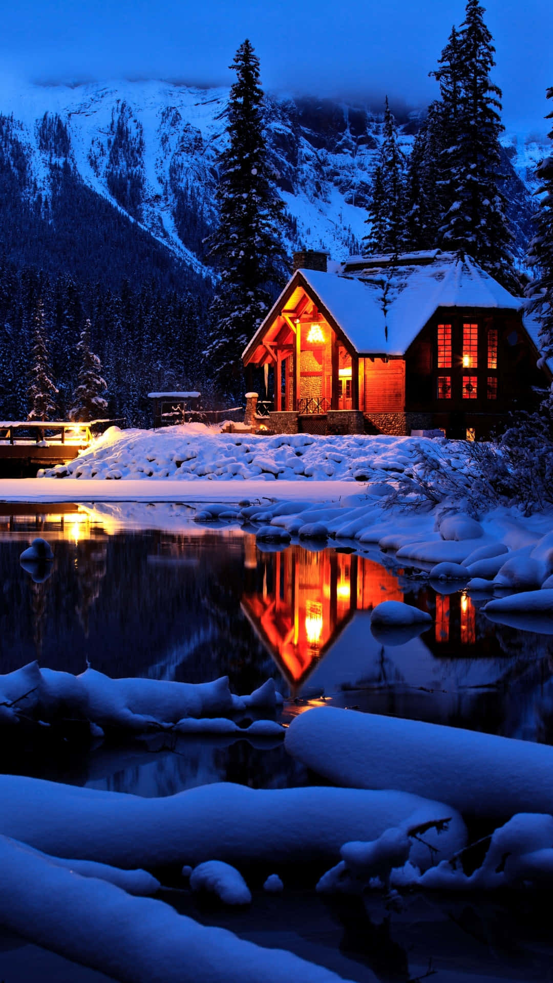 Winter_ Cabin_ Night_ Reflected_in_ Snow Wallpaper